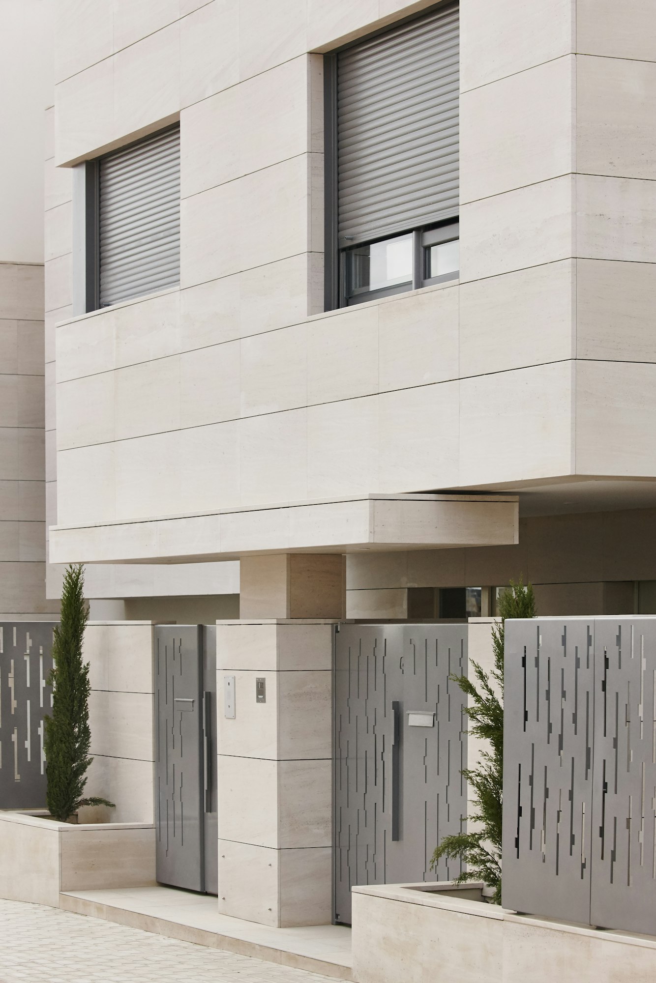 Modern residential building entrance. Estate property. Marble stone. Construction. Vertical